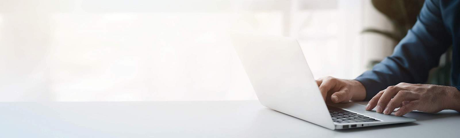 person typing on laptop doing a provider search